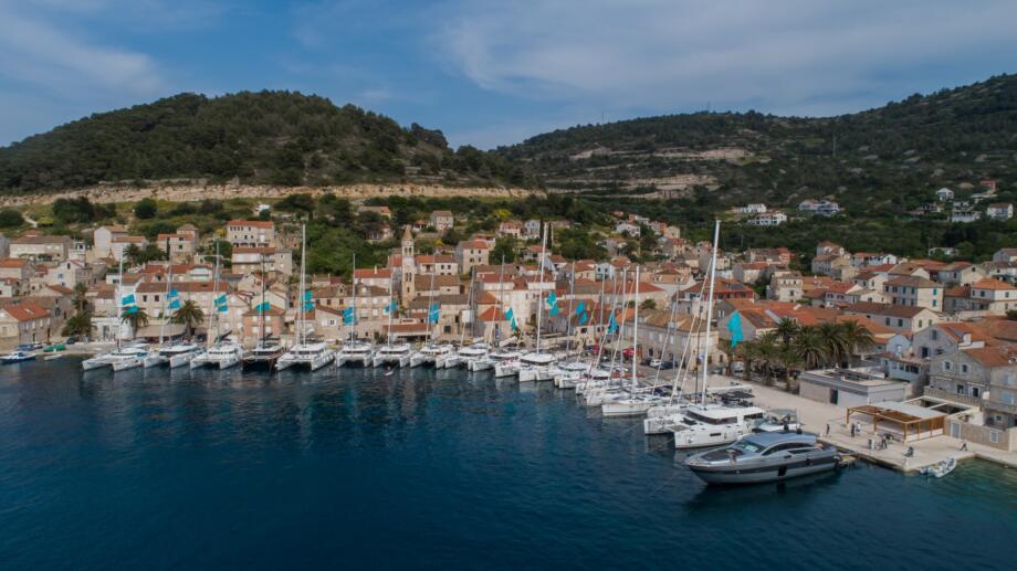 Aerial view of Vis port with docked Lagoon catamarans