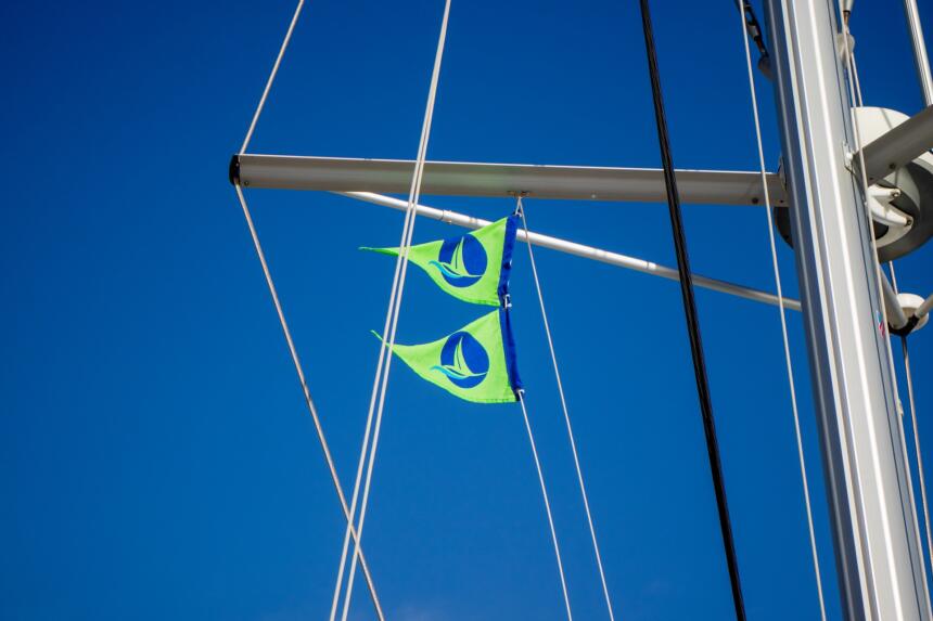 green-sail-flags-on-our-boats-raise-awareness-of-our-clients-to