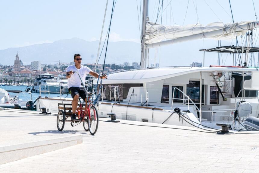 Nava employees biking within marina in Split