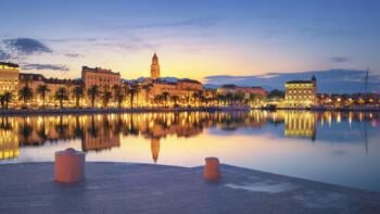 split view of riva and old town at dawn